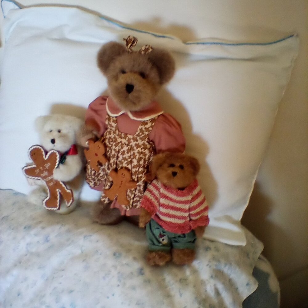 Three teddy bears,brown and tan